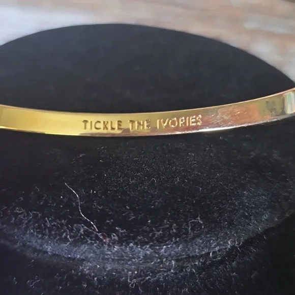 kate spade "Tickle The Ivories" Gold Tone Thin Bangle with Pink Drawstring Pouch - Picture 4 of 4